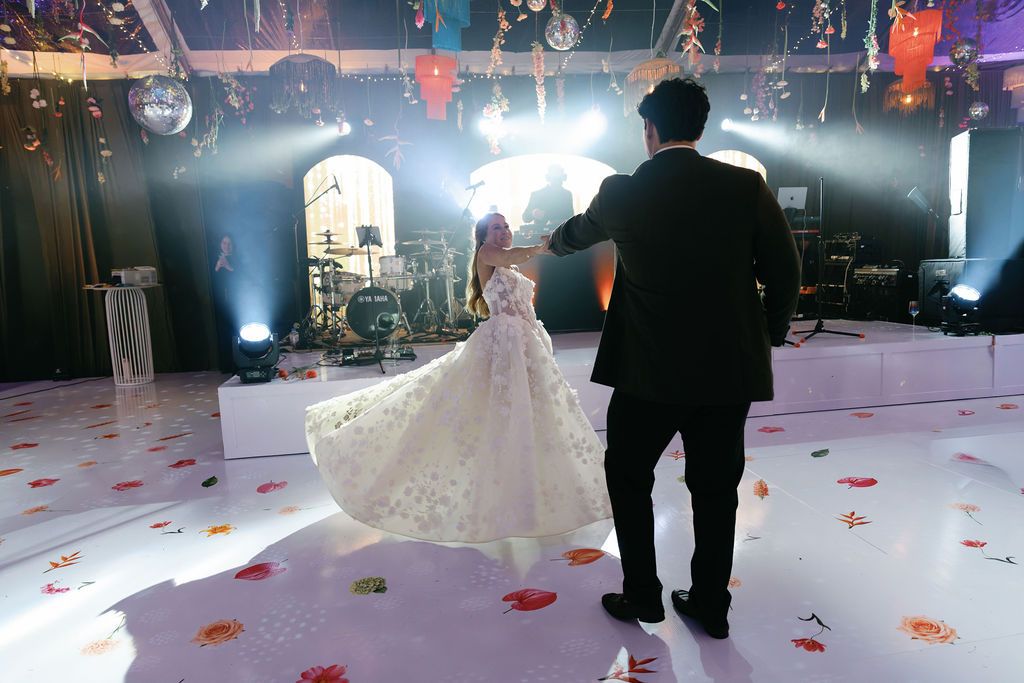 Maureen and Major sharing their first dance during their wedding reception in Costa Rica