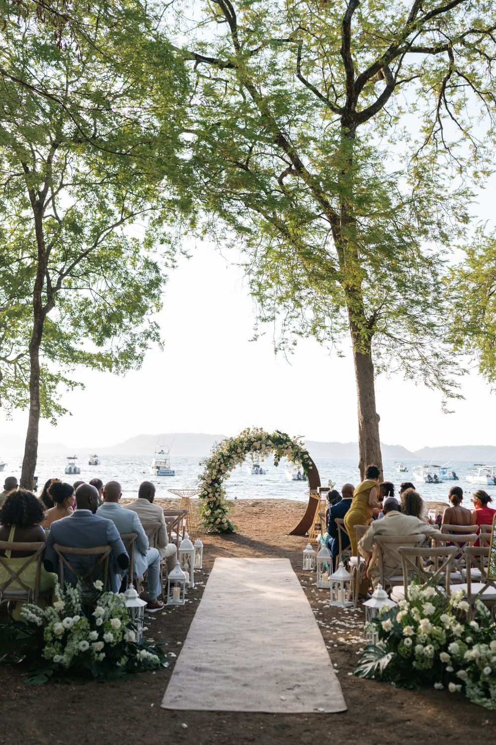 Beachfront wedding ceremony setup at El Mangroove on Playa Panama