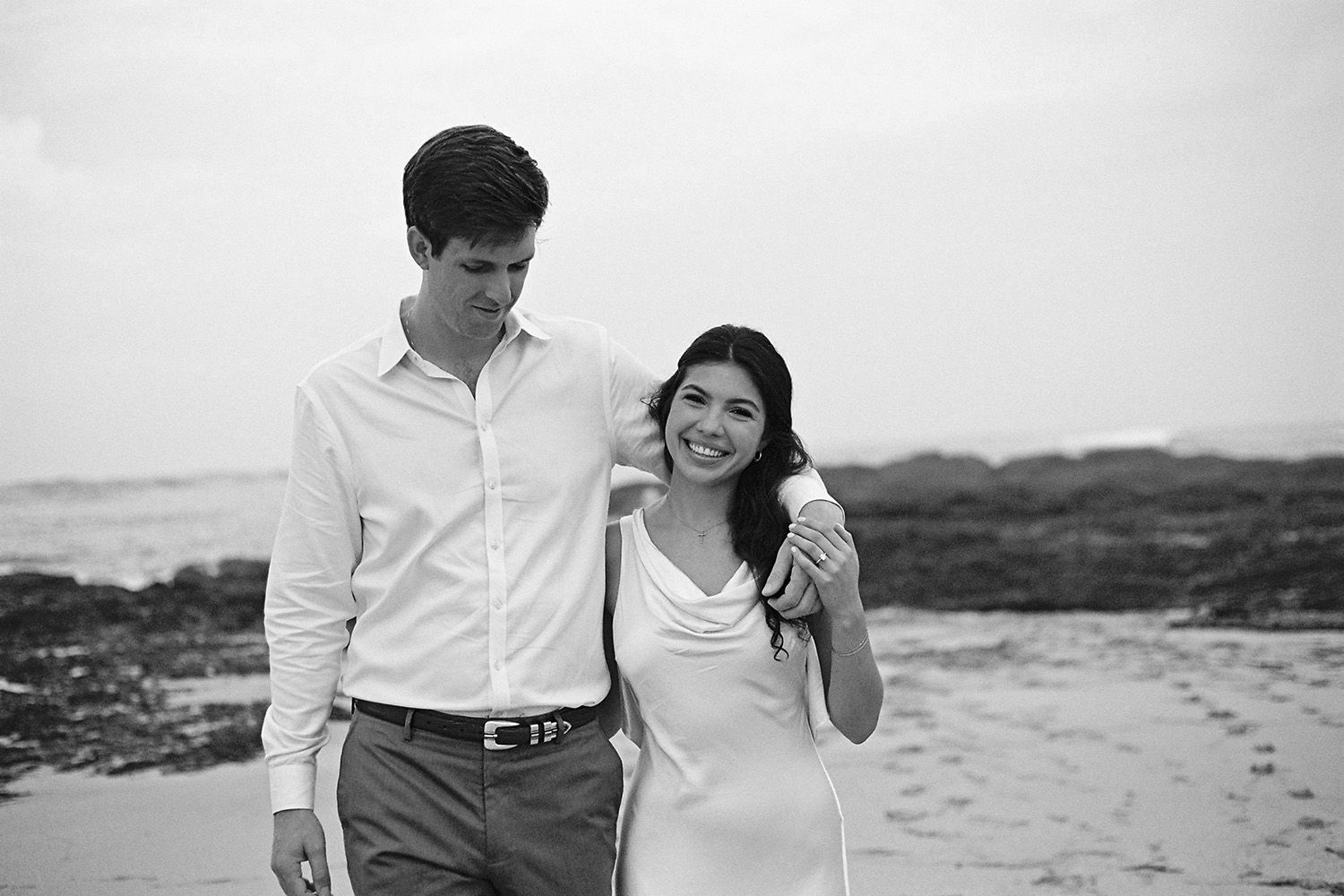 Couple sharing an intimate moment during an engagement session in Costa Rica.