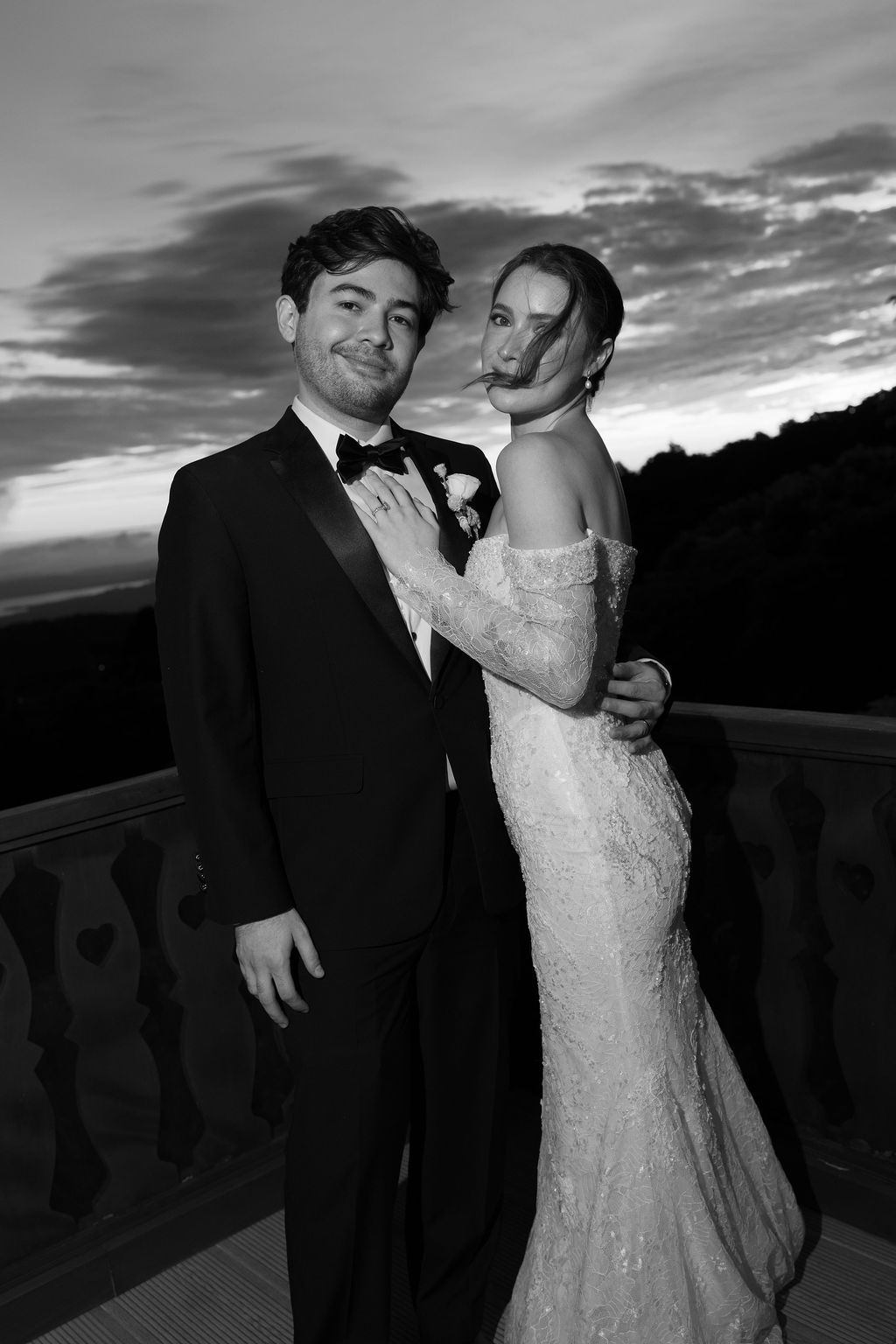 Black and white evening portrait of the bride and groom overlooking Monteverde