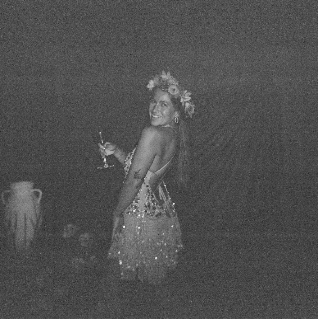 Wedding guest celebrating during Maureen and Major's Costa Rica reception, photographed on film