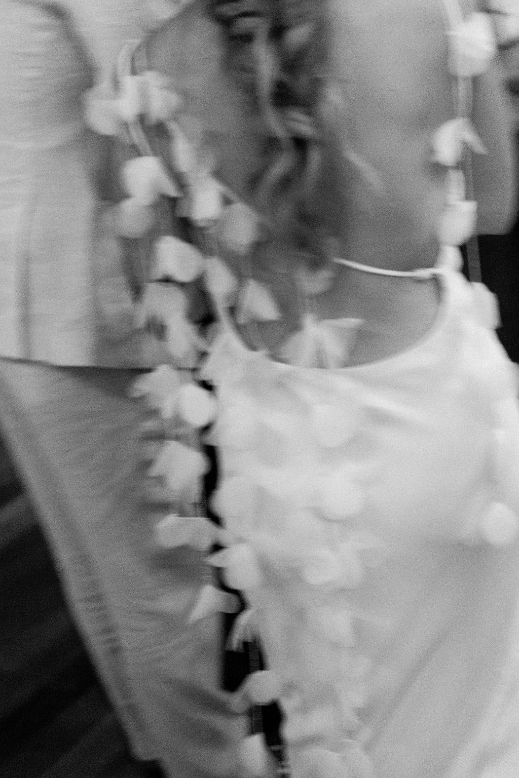 Black and white candid moment during Maureen and Major's wedding weekend in Costa Rica