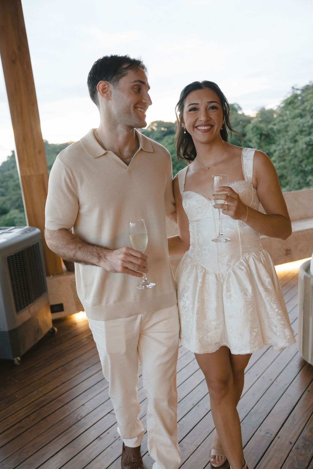 Couple enjoying their intimate wedding weekend overlooking the rainforest in Manuel Antonio
