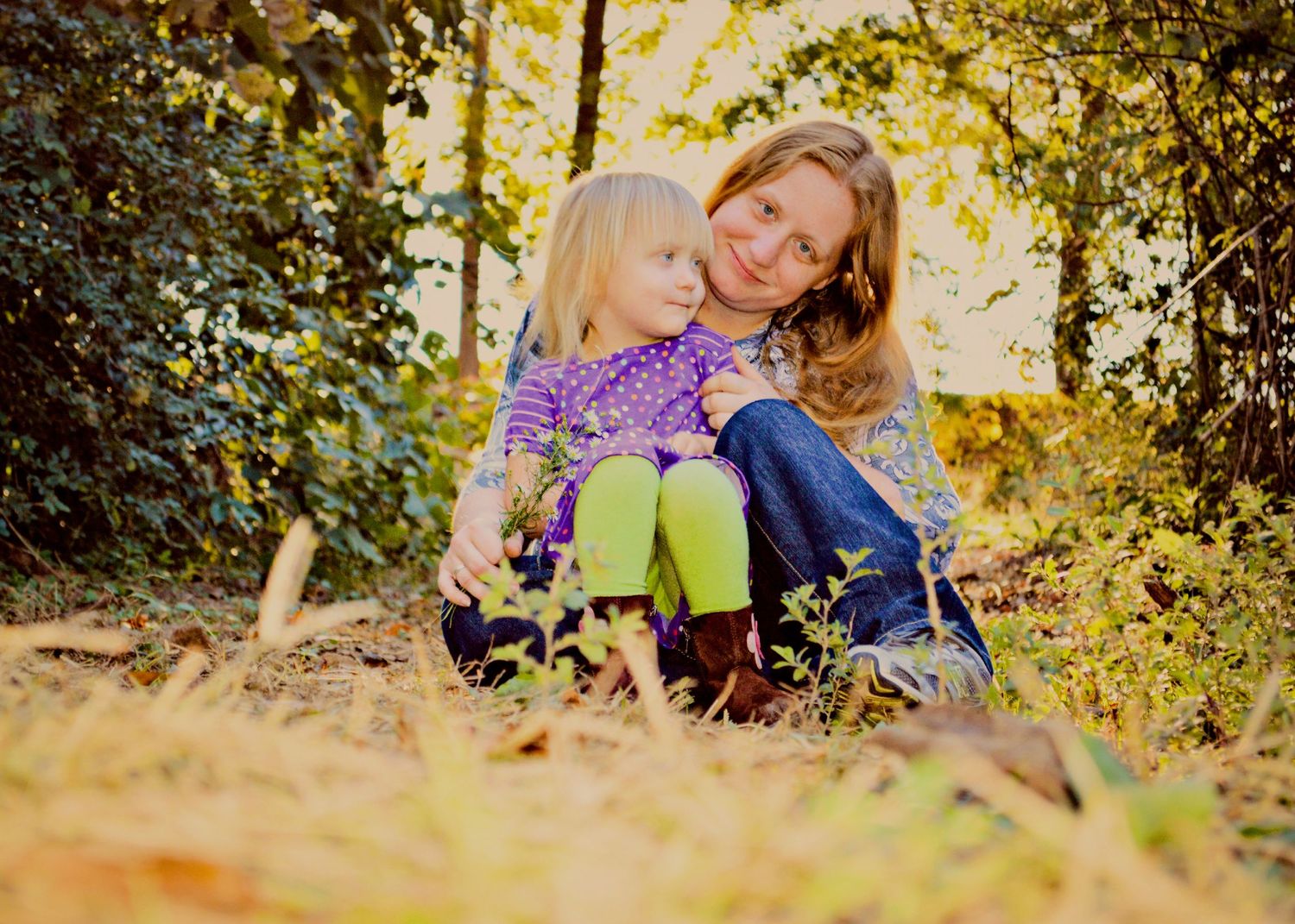 Beautiful outdoor natural light photo of mother and daughter
