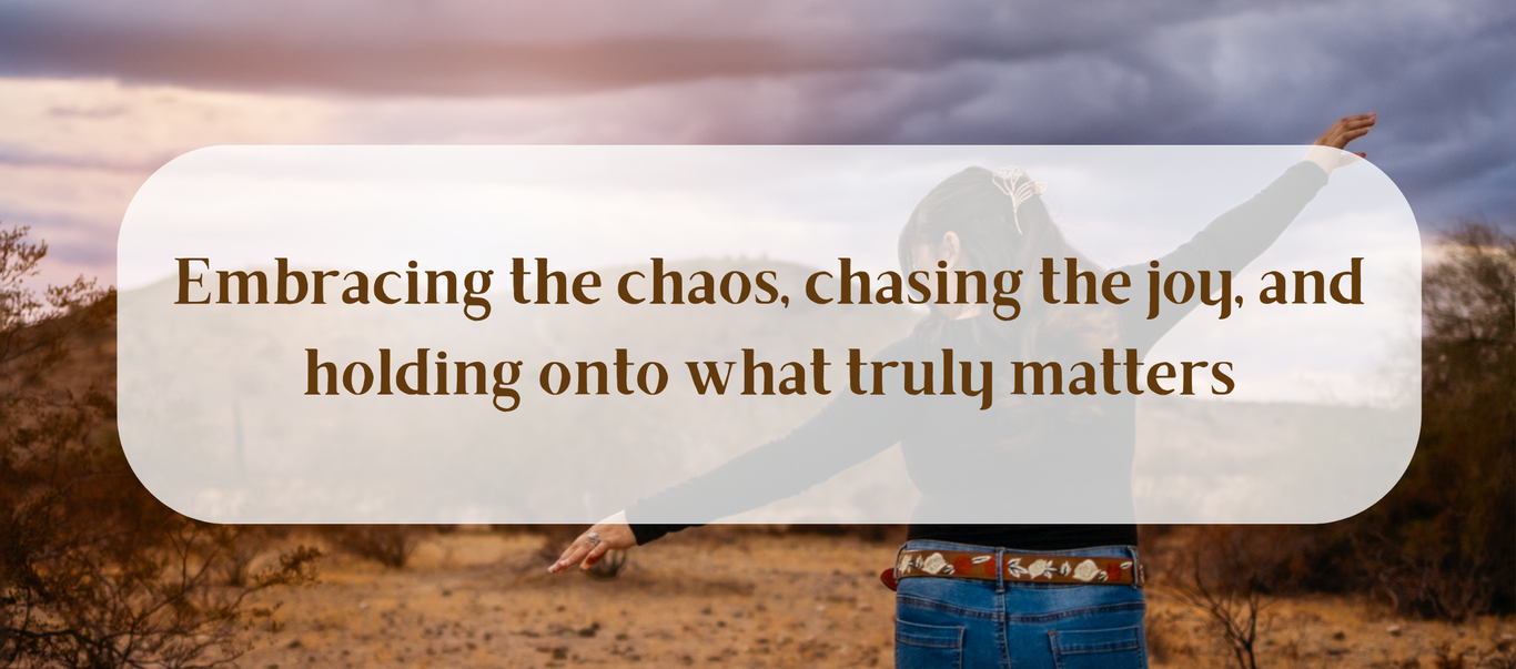 Inspirational text overlay on mountain landscape about embracing chaos and joy.