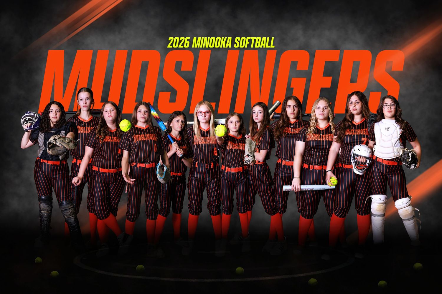 2026 Minooka Softball Mudslинgers team photo featuring players in black and orange uniforms posed together.