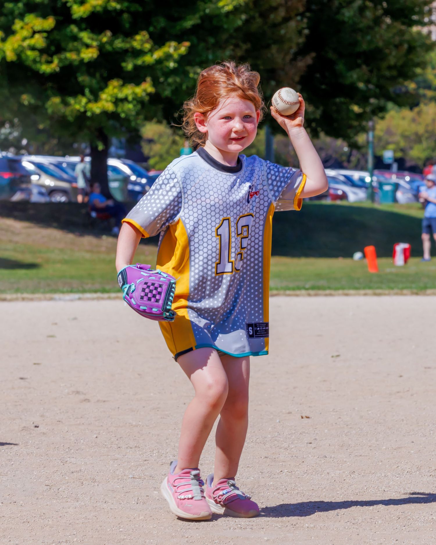 A baseball player in motion shows their pitching technique in a series of sequential action shots on a sunny day.