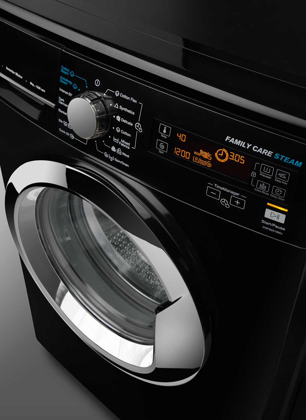 Modern black washing machine with digital display and chrome door featuring advanced control settings.
