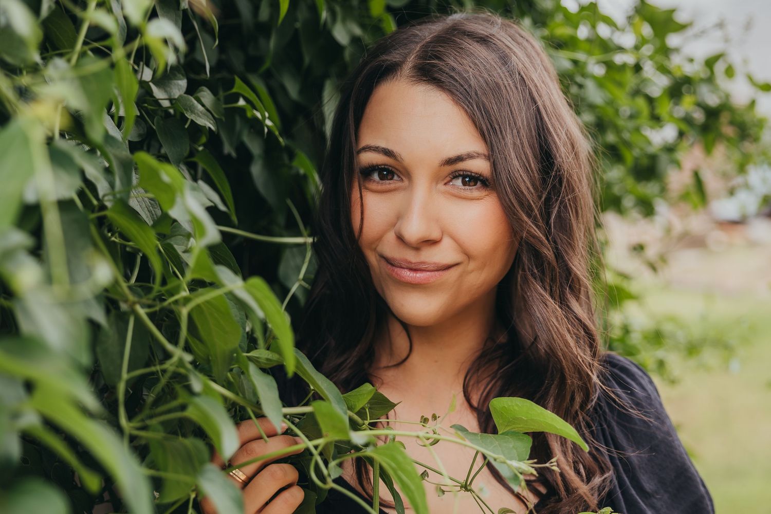 A series of outdoor portrait photos showing someone with dark hair smiling against a natural green background.