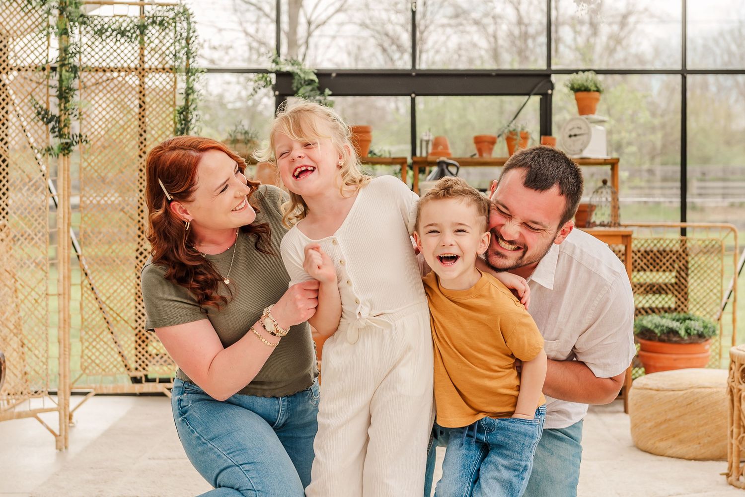 Candid family lifestyle session with playful poses and natural interactions.