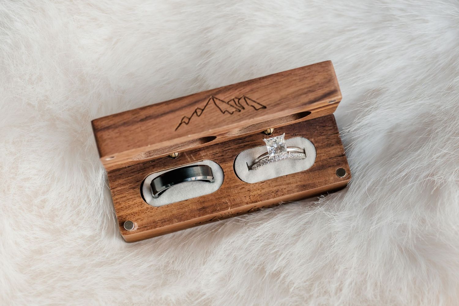 Handcrafted wooden bottle opener with rustic design shown in multiple angles on white fur background.