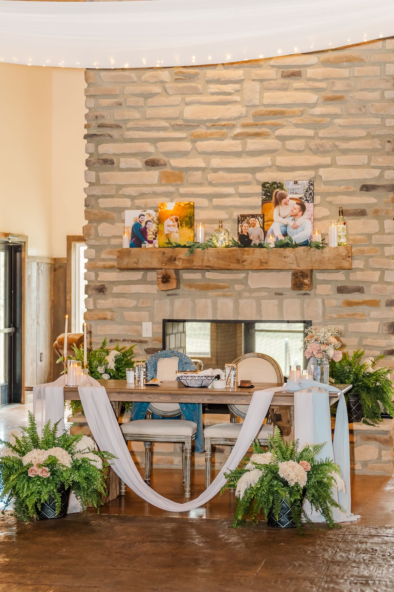 Sweetheart table rustic wedding reception at The Old Barns at Dry Run Farms in Williamsport, Ohio.
