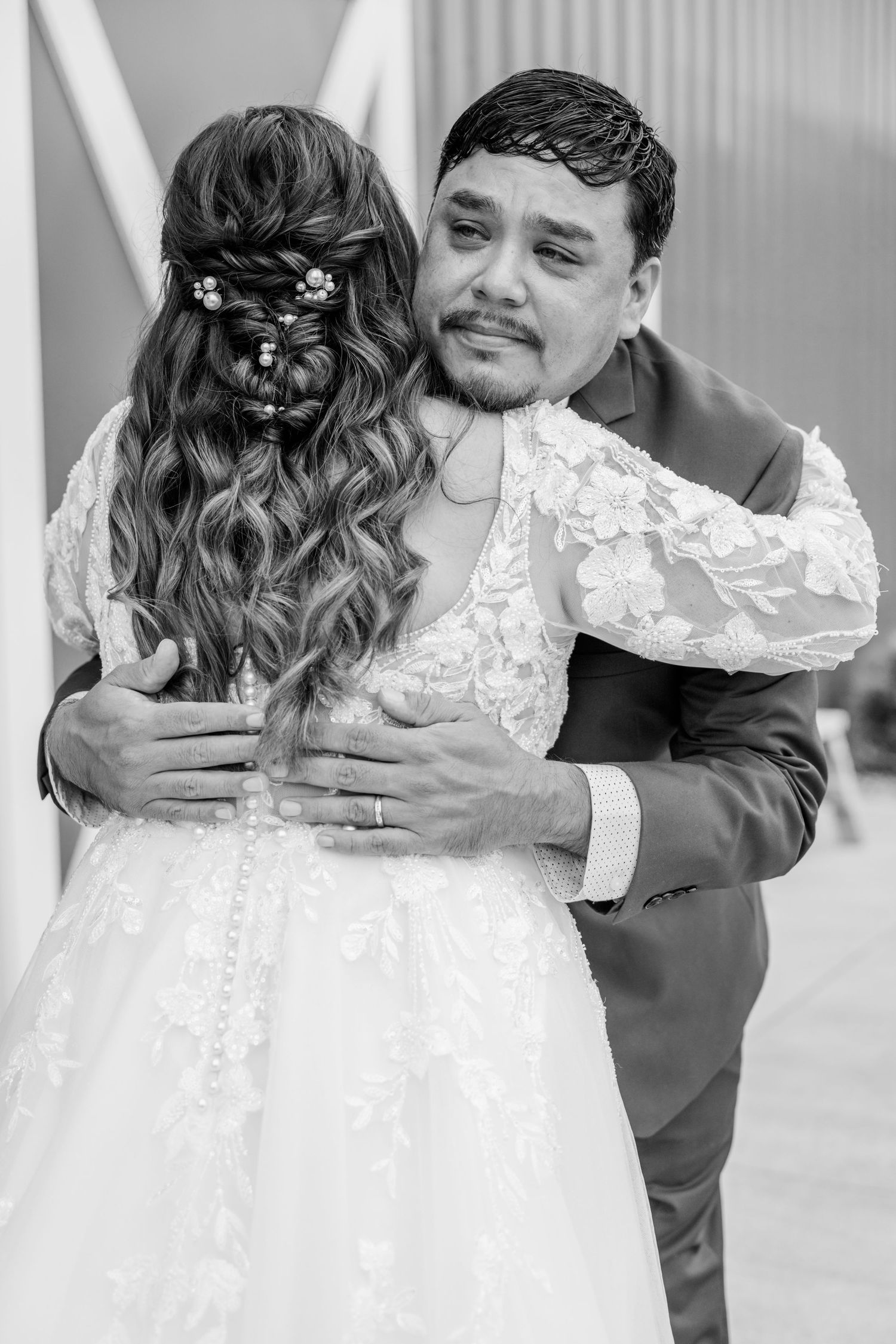 Black and white photo sequence showing a romantic first dance between newlyweds.