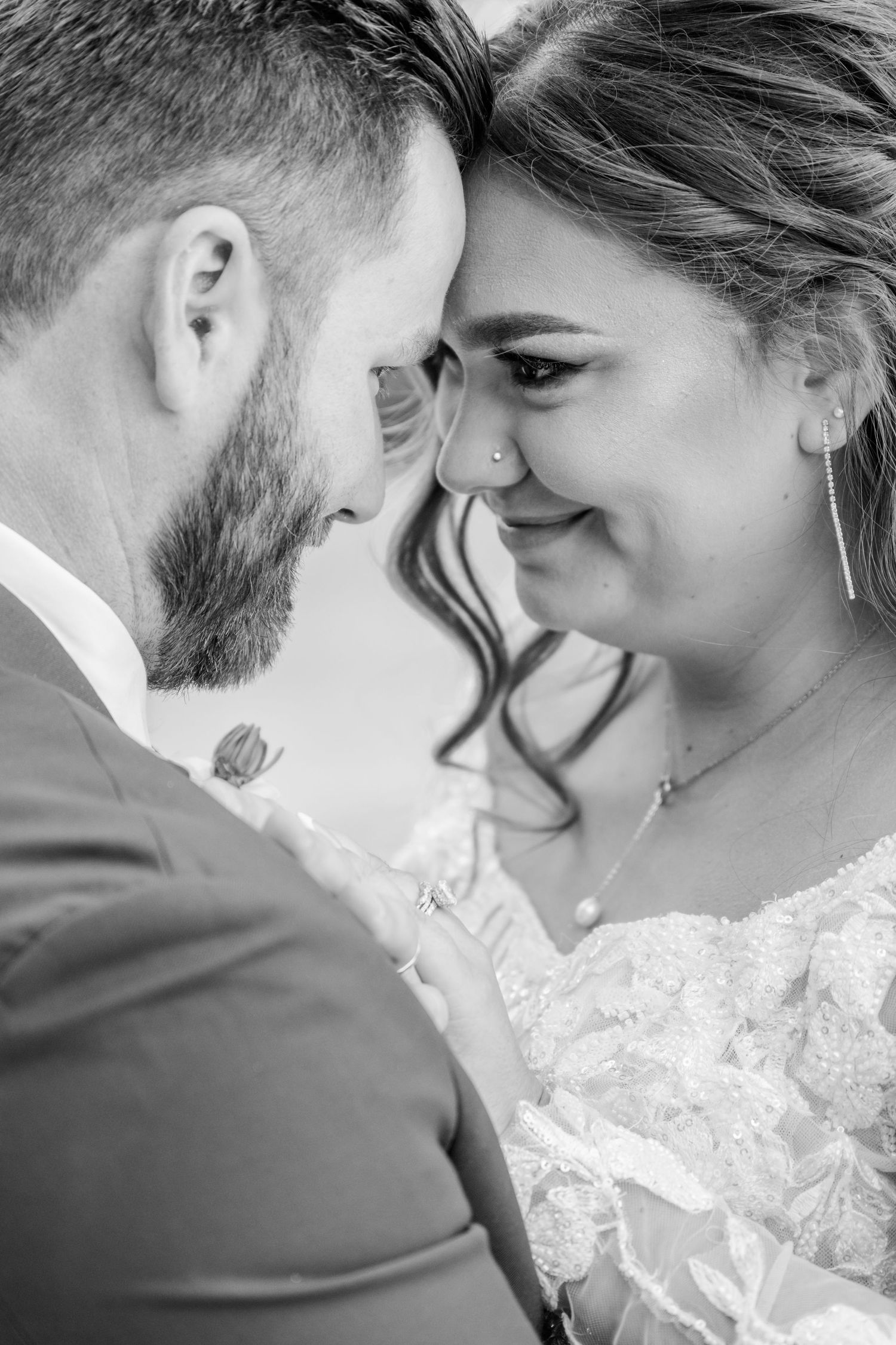 Black and white close-up series of romantic wedding couple moments.Four Seasons Barn Wedding & Event Venue