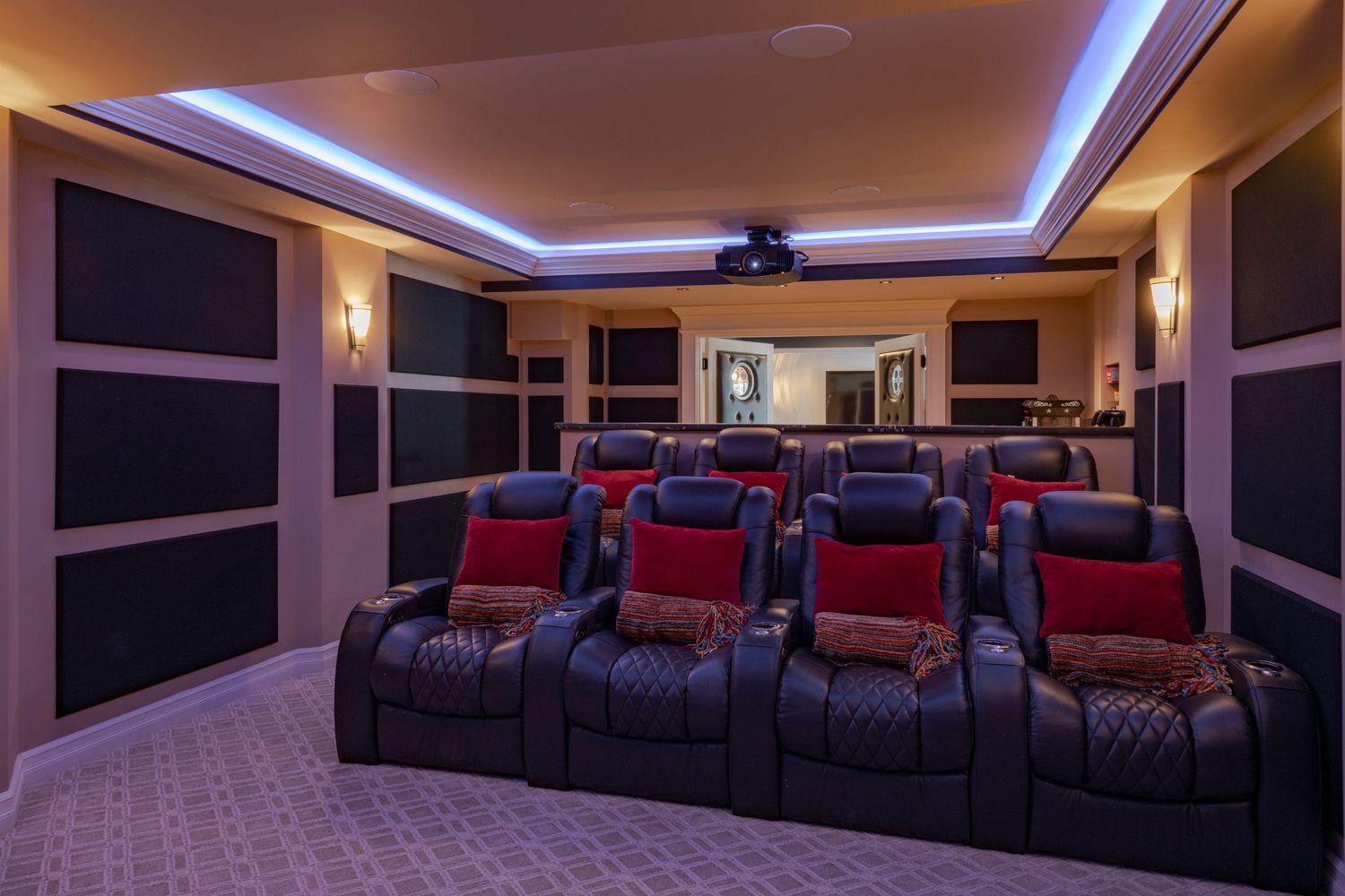A luxurious home theater room taken by top real estate photographer