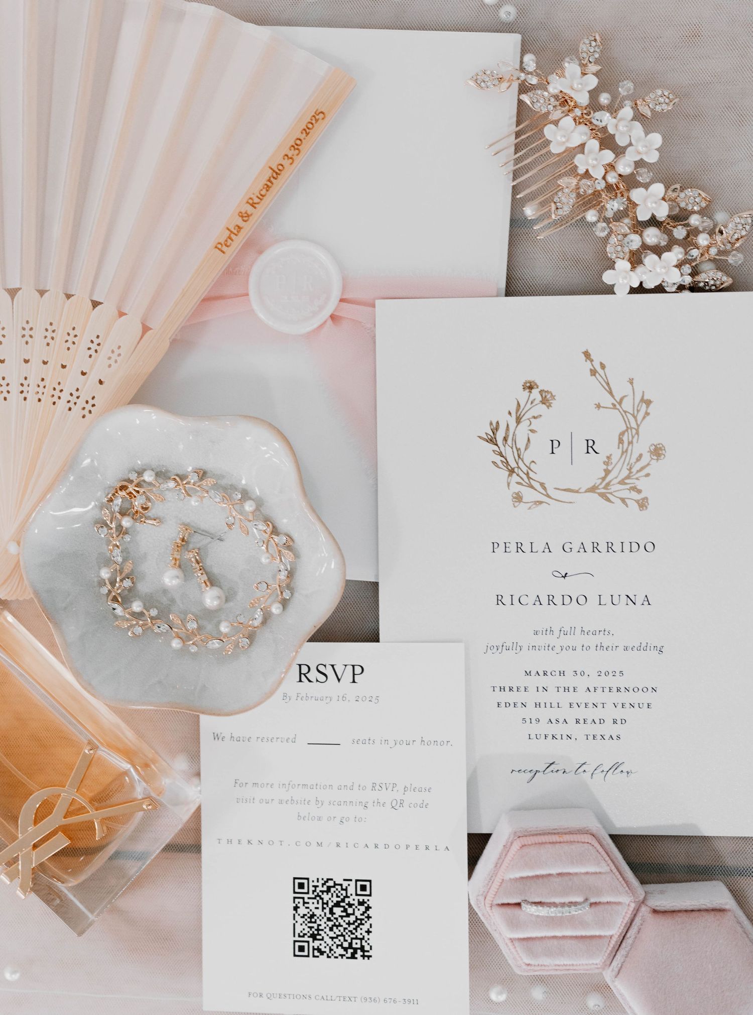 Elegant wedding invitation suite in white and blush pink with floral accents.