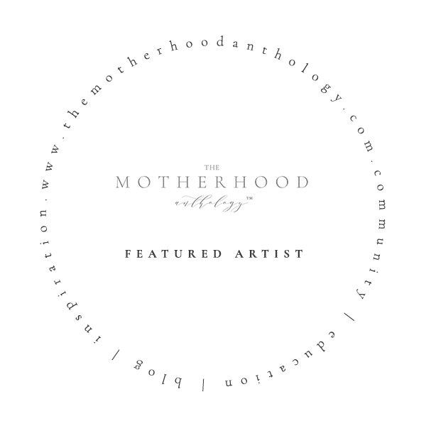 A black and white circular logo design featuring 'MOTHERHOOD' text surrounded by decorative dots in a round border.