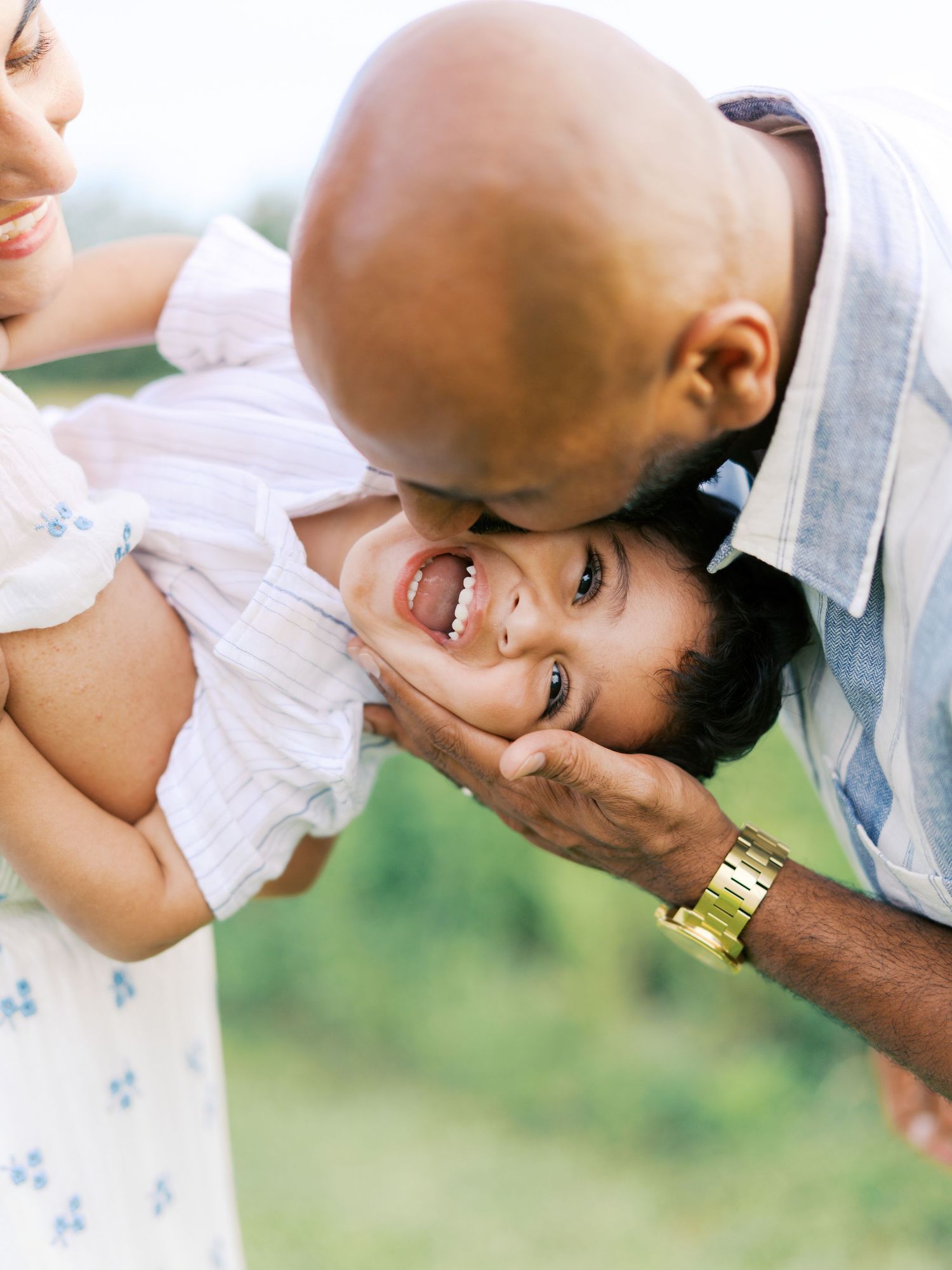 A tender moment captured in a series of intimate black and white portraits showing gentle affection and connection.