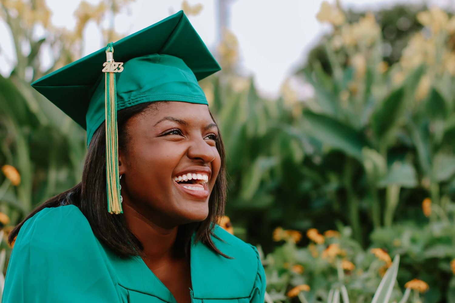 Candid graduation portrait celebrating academic achievement at UAB
