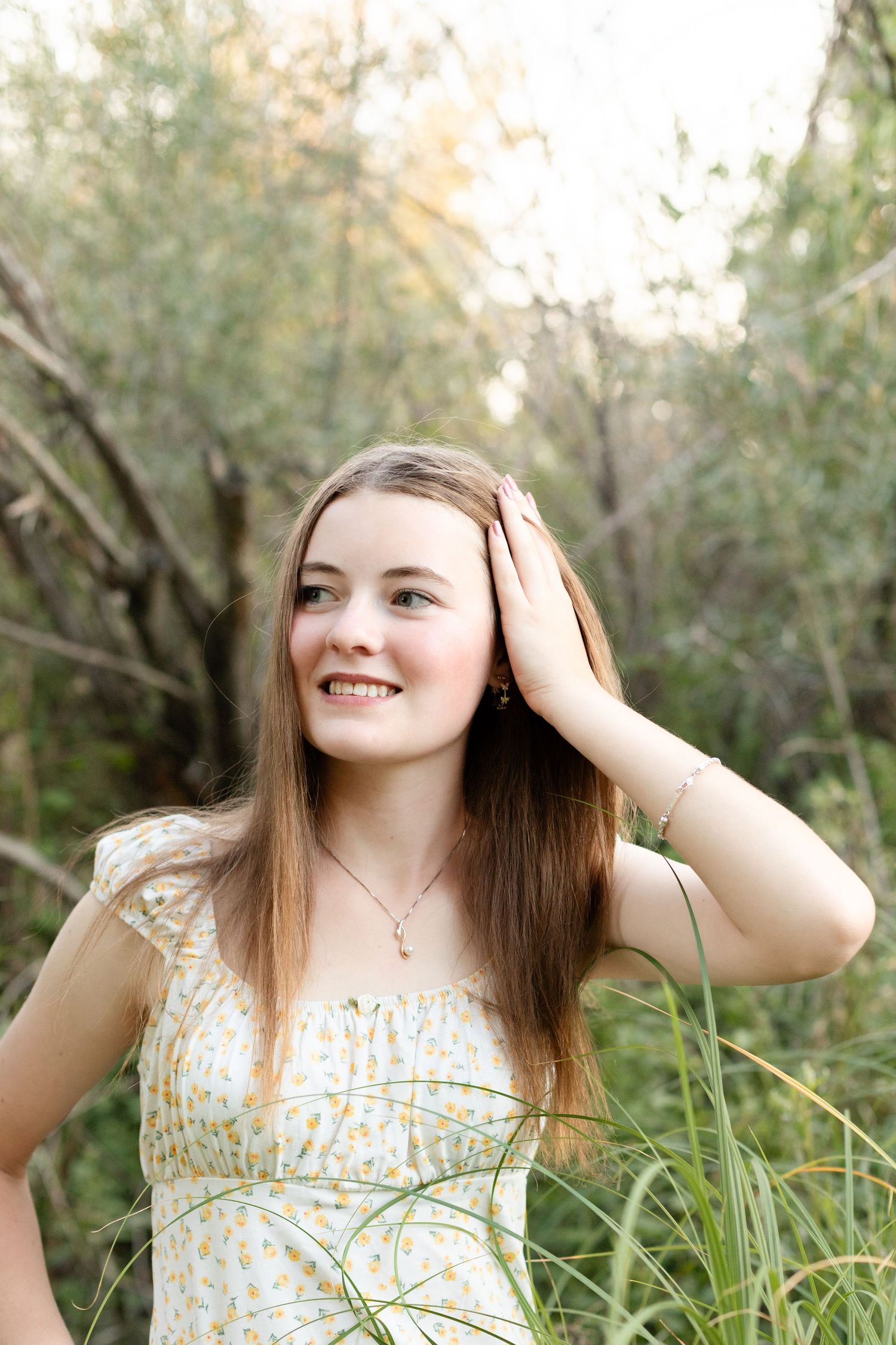 A sequence of outdoor portraits captured in tall grass during golden hour lighting.