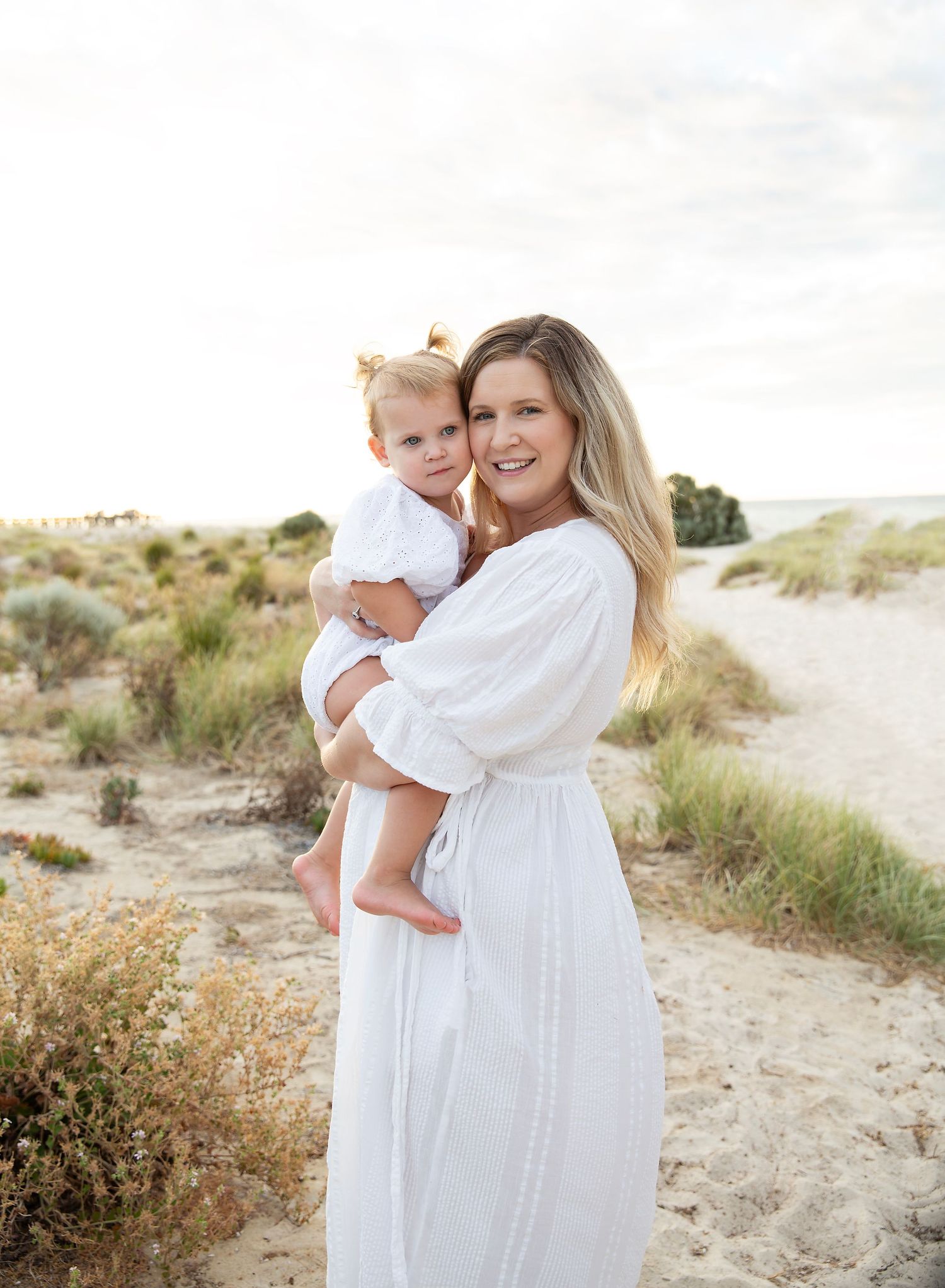 mummy and me in matching outfits at the beach
