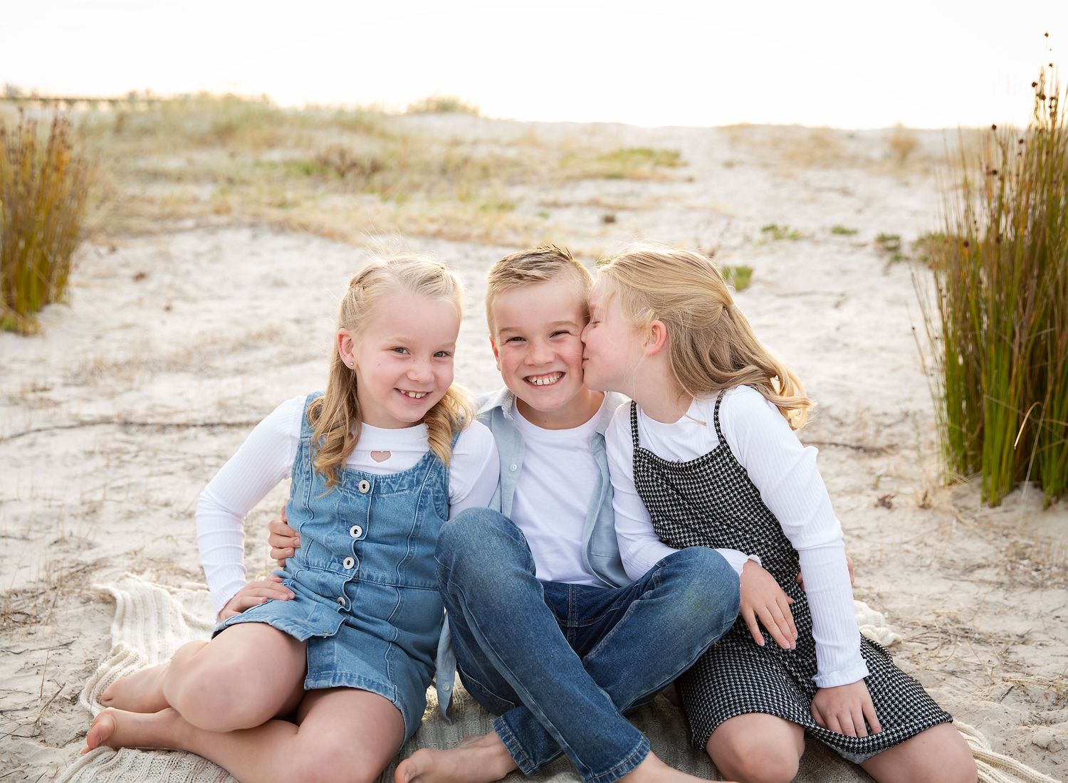 A brother blushes as his little sister