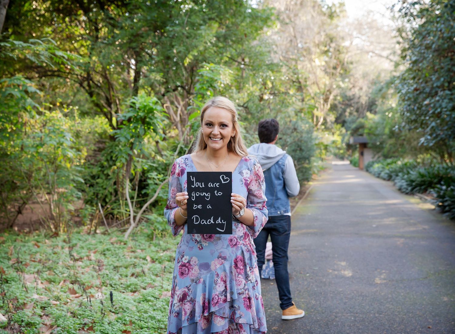 Cute couple pregnancy announcement photo, surprise pregnancy reveal in Botanic Gardens Adelaide SA
