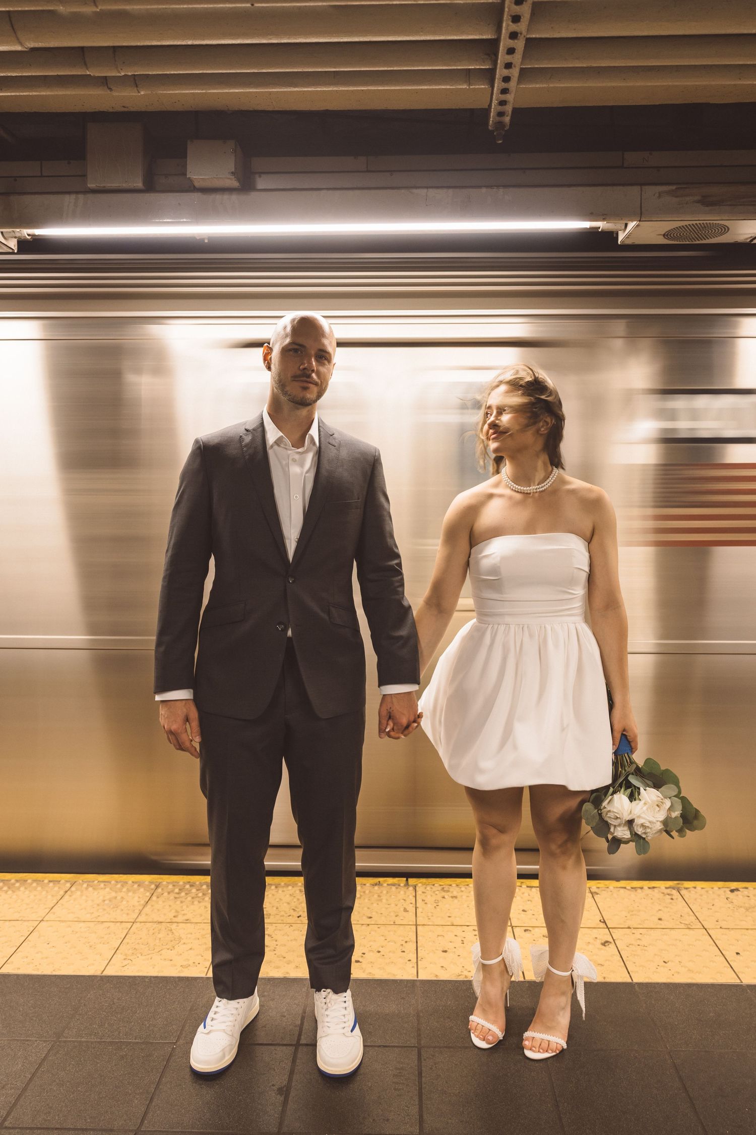 Couple smiling at each other during their photo shoot