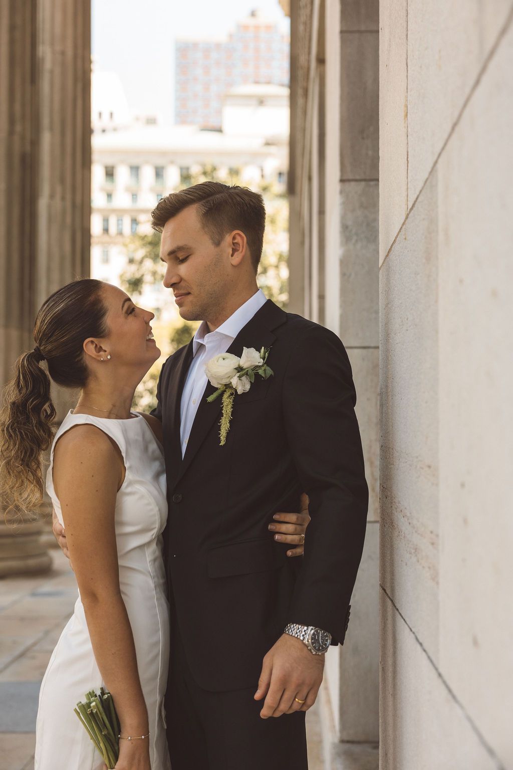 picture of the newlyweds smiling at each other