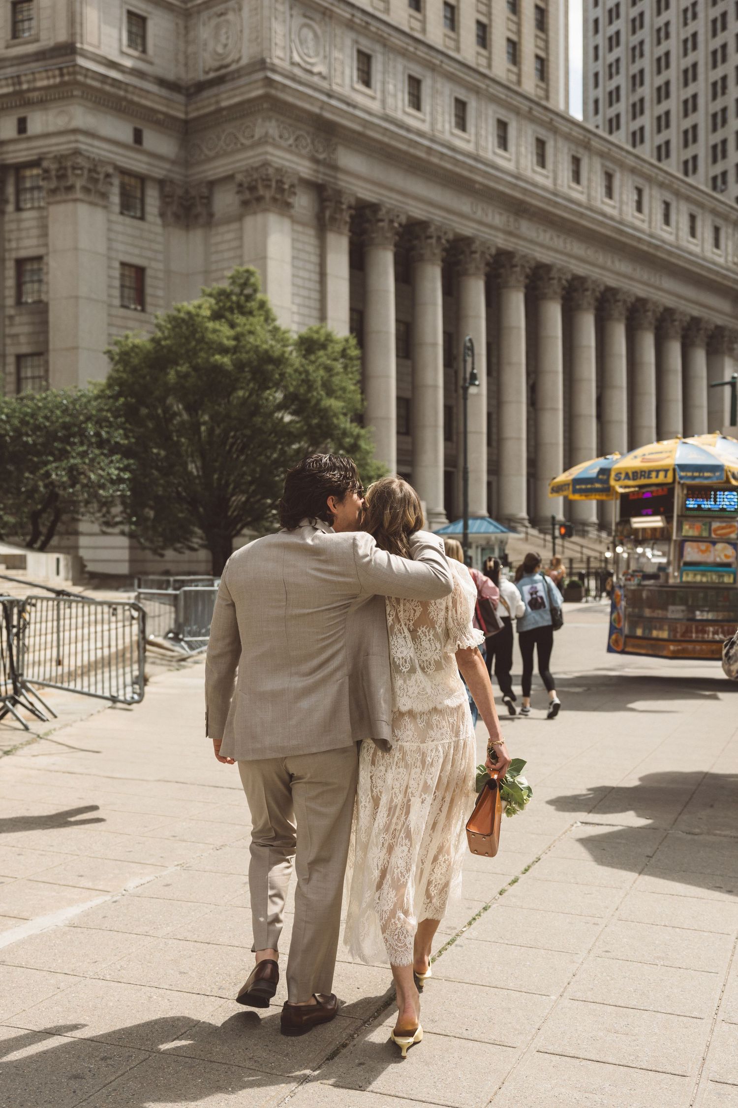 cute picture of the newly married couple kissing