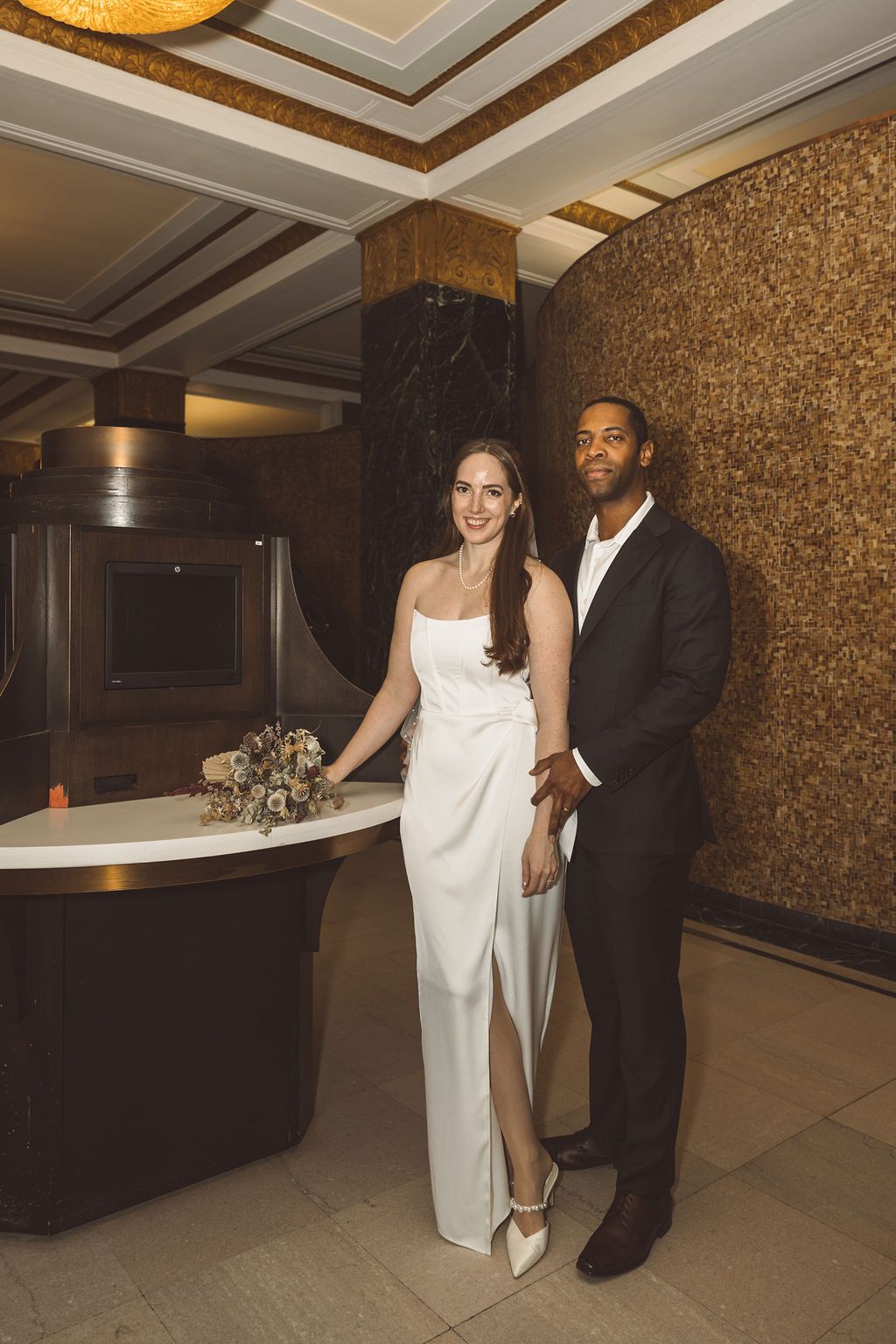 cute picture of the bride and groom holding hands