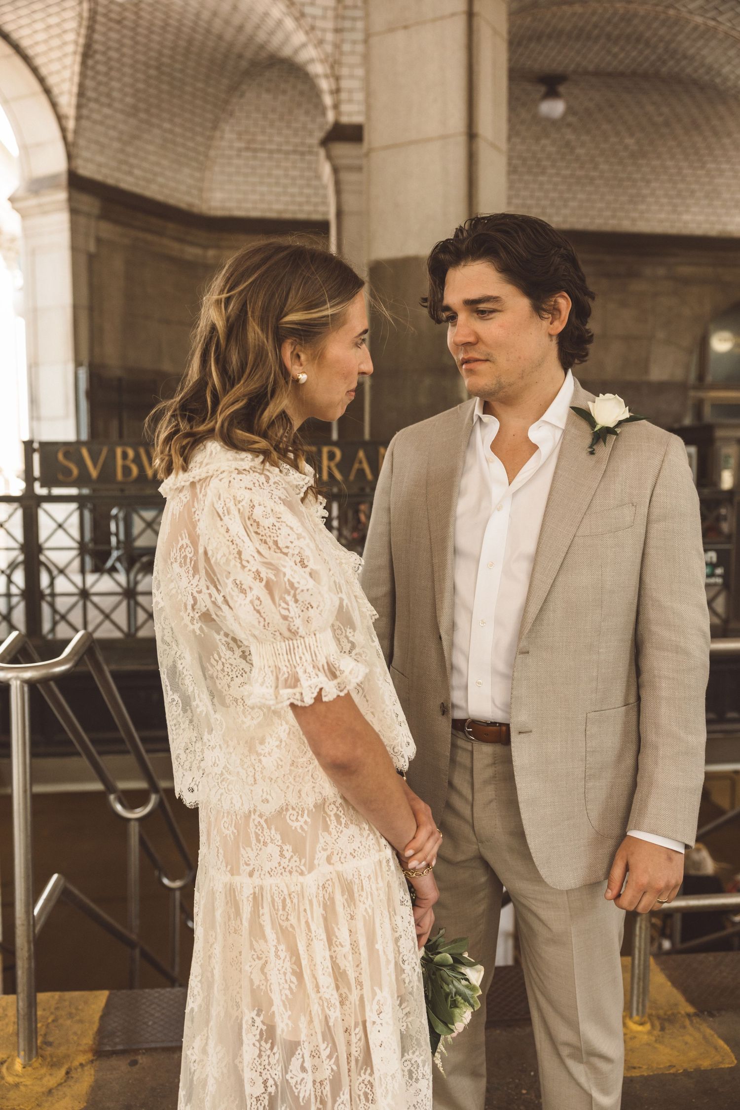 newly married couple laughing with each other during their photoshoot