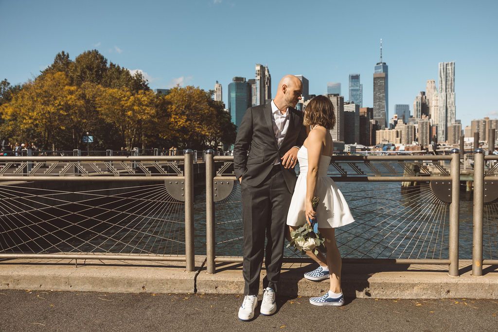 cute picture of the newlyweds walking around manhattan