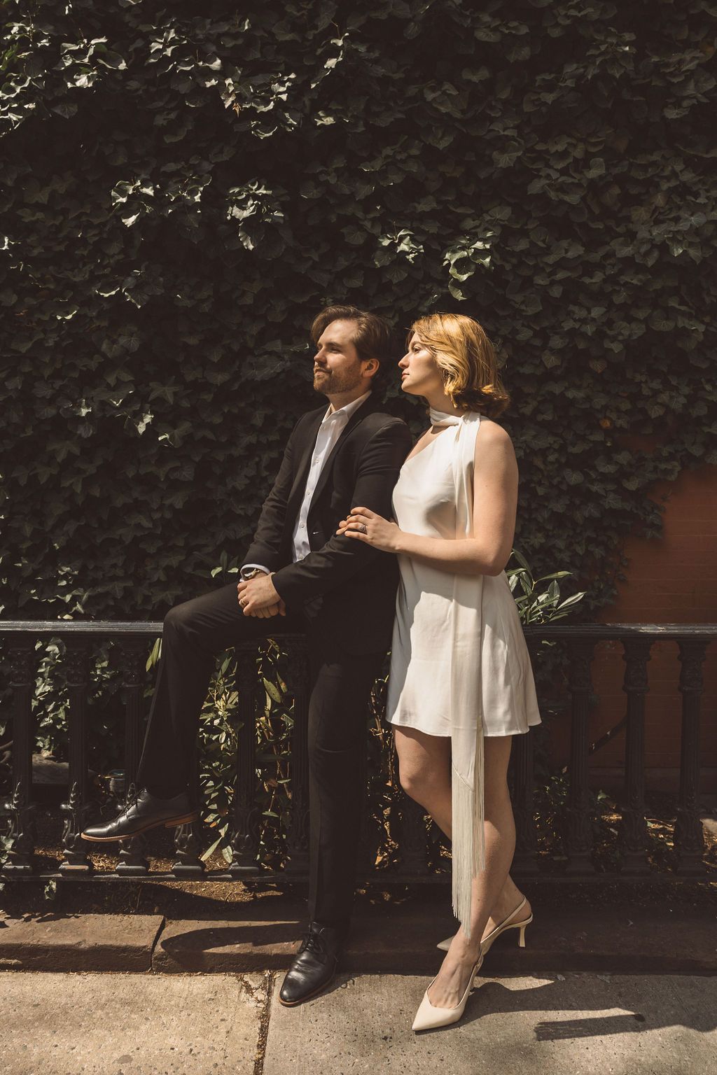 couple walking around NYC during their photoshoot
