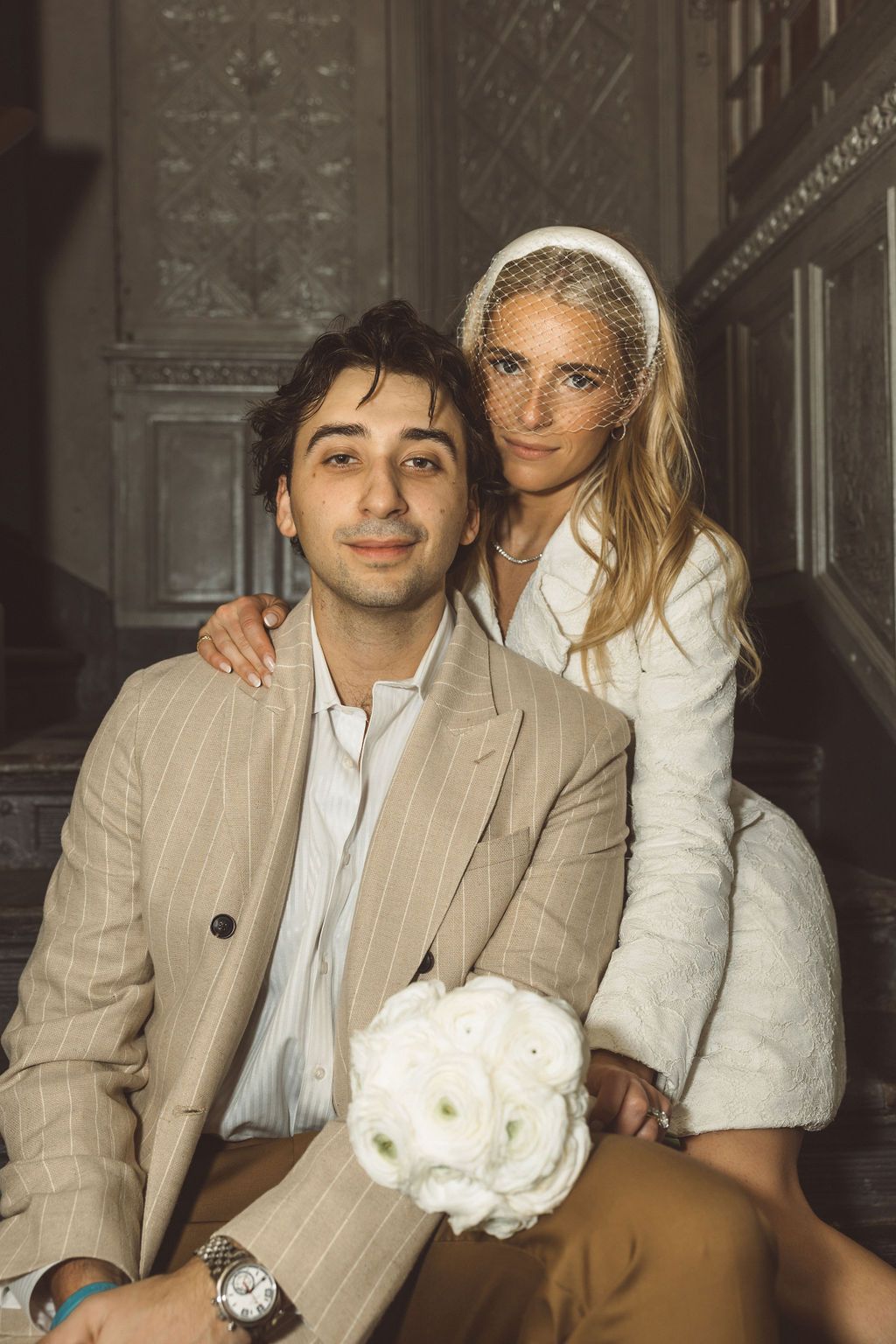 couple smiling at the camera during their bridal portraits