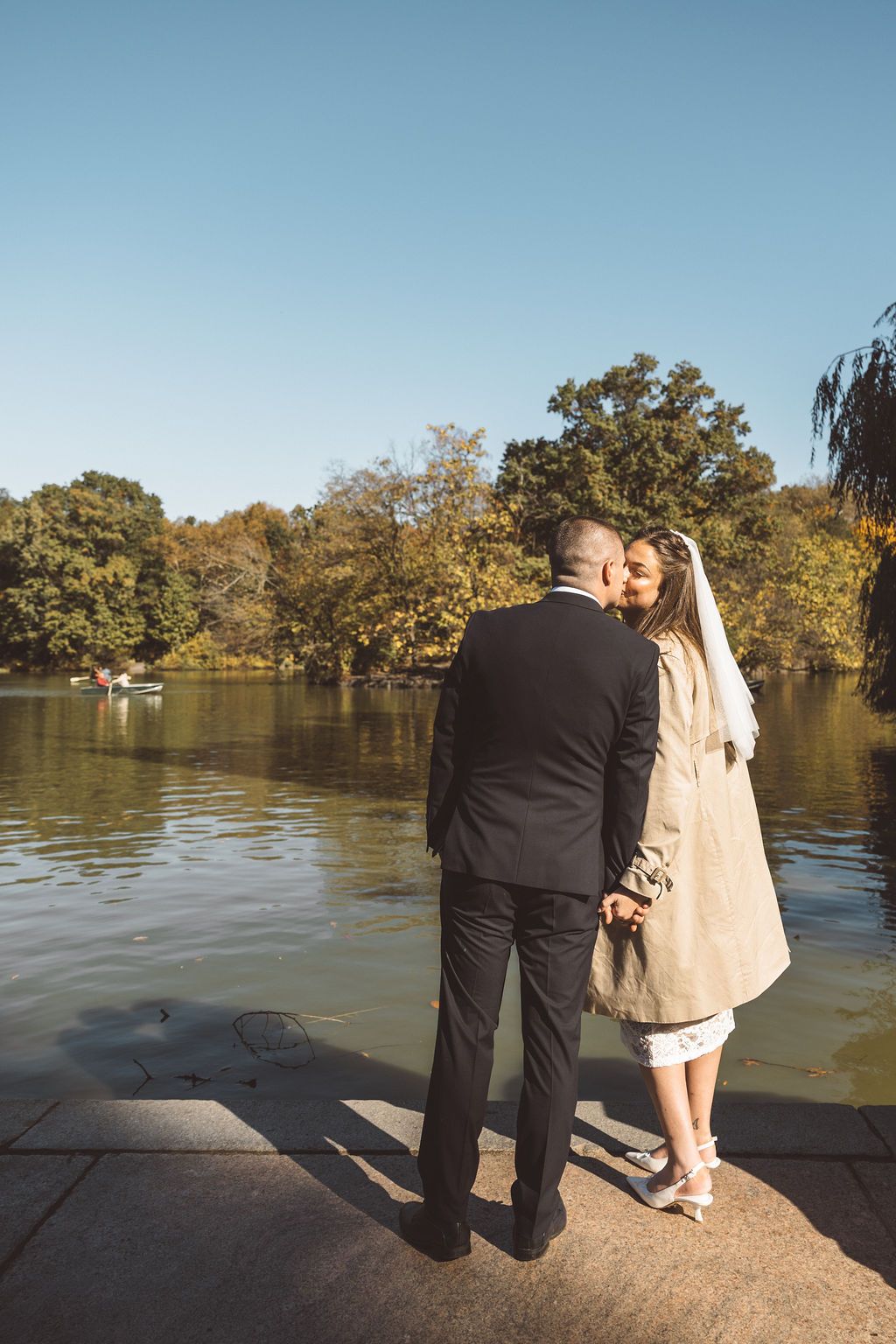 cute picture of the newlyweds kissing