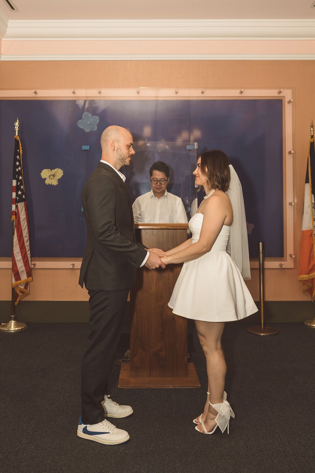 couple holding hands during their ceremony