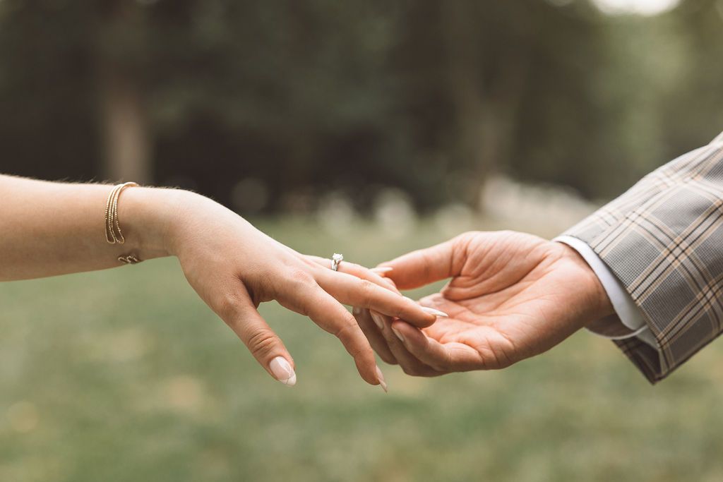 beautiful picture of the newlyweds holding hands