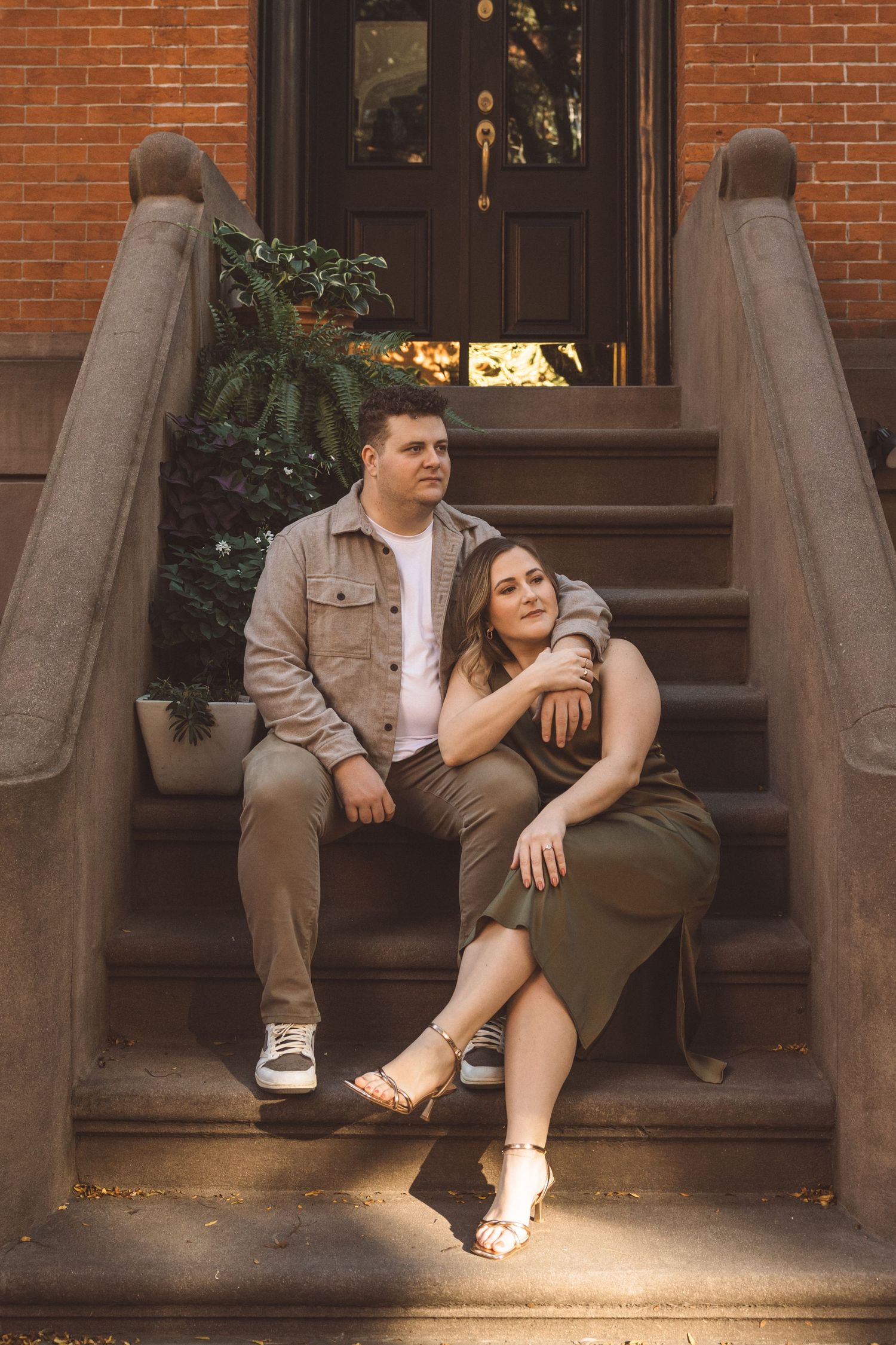 couple posing for the camera during their photoshoot