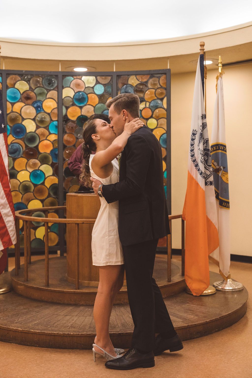 bride and groom kissing after their ceremony