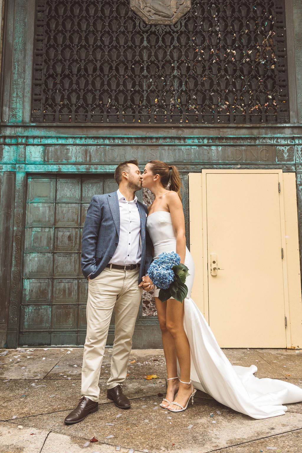 cute picture of the newlyweds kissing