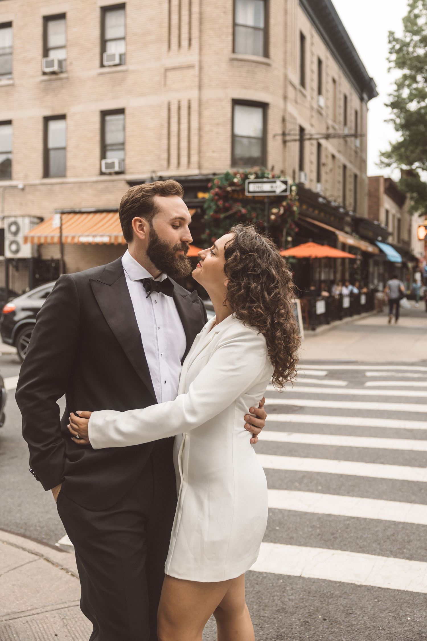cute portrait of the newly engaged couple laughing with each other