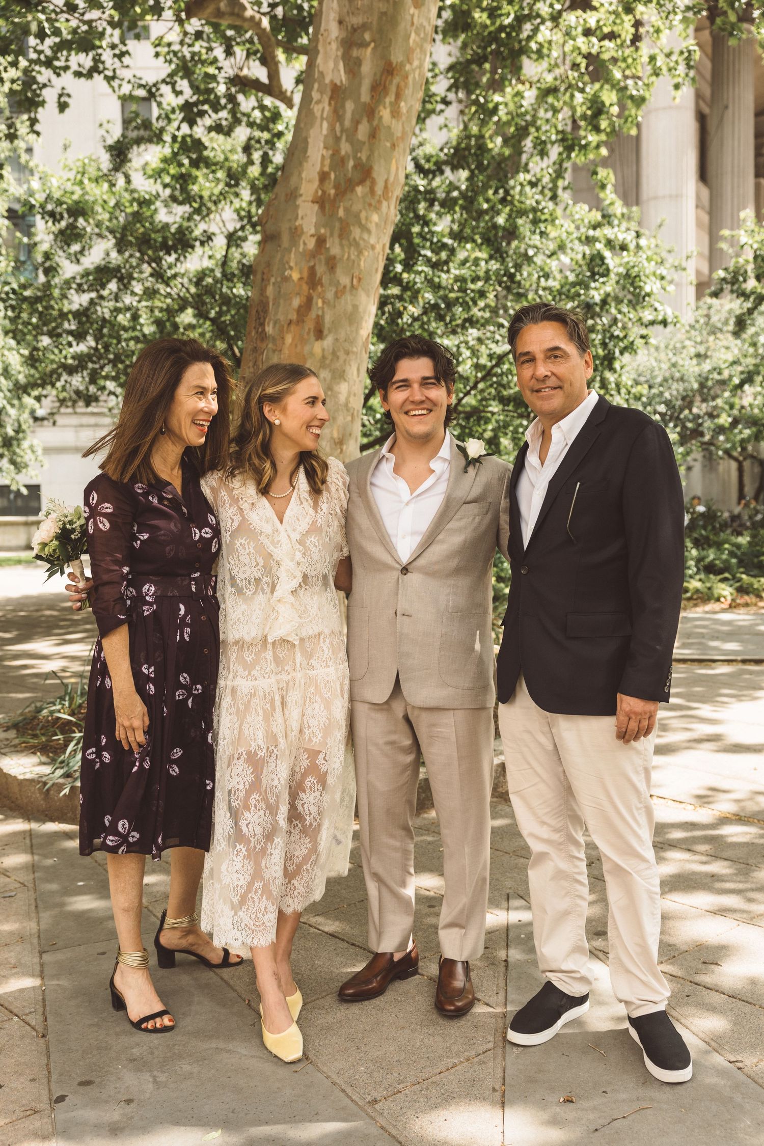 cute family portraits after the wedding ceremony