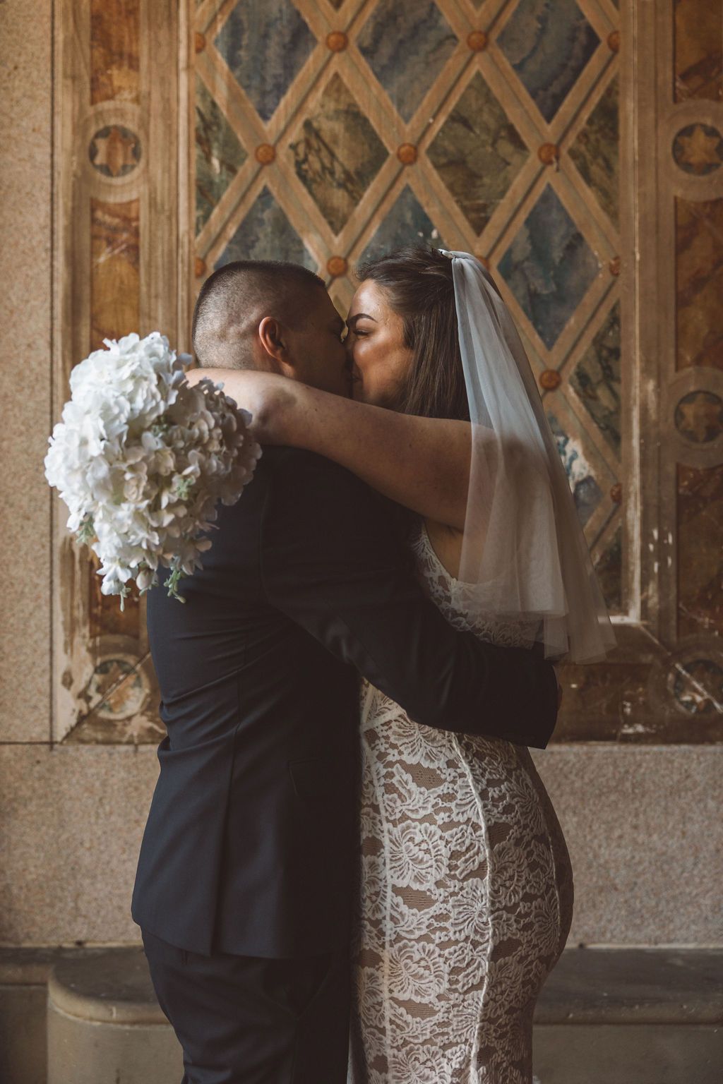 cute picture of the bride and groom kissing after their elopement ceremony