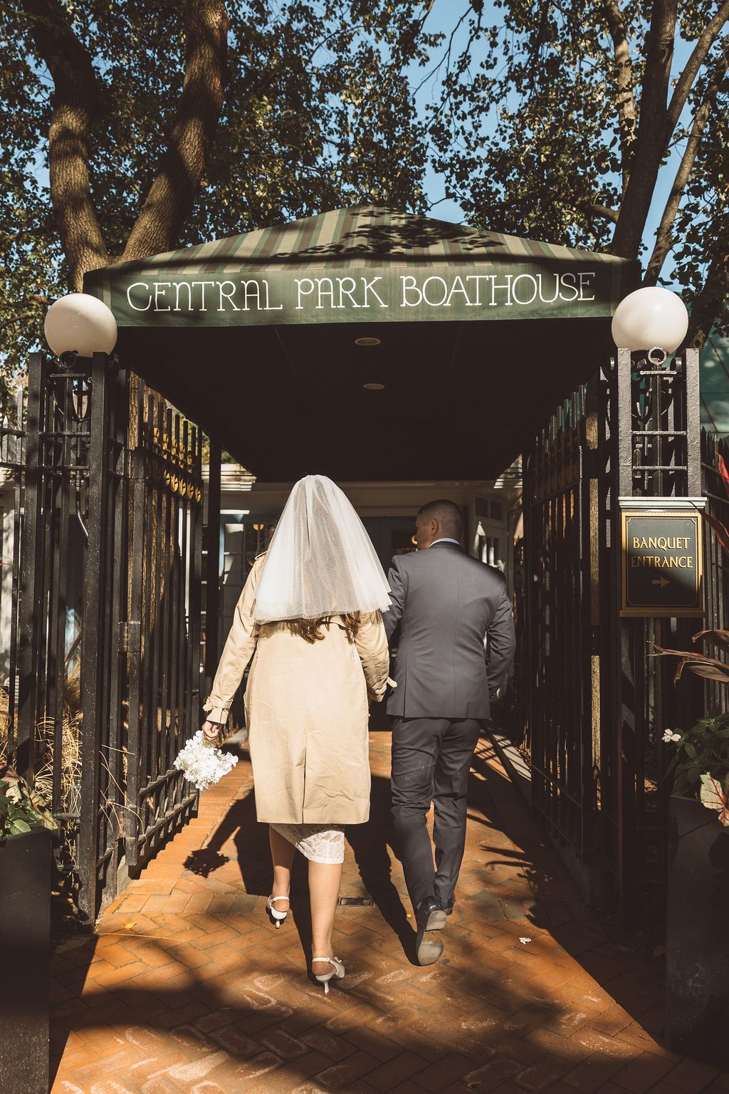 couple celebrating their elopement with drinks