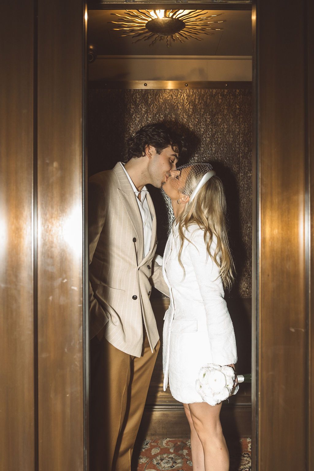 cute picture of the bride and groom kissing
