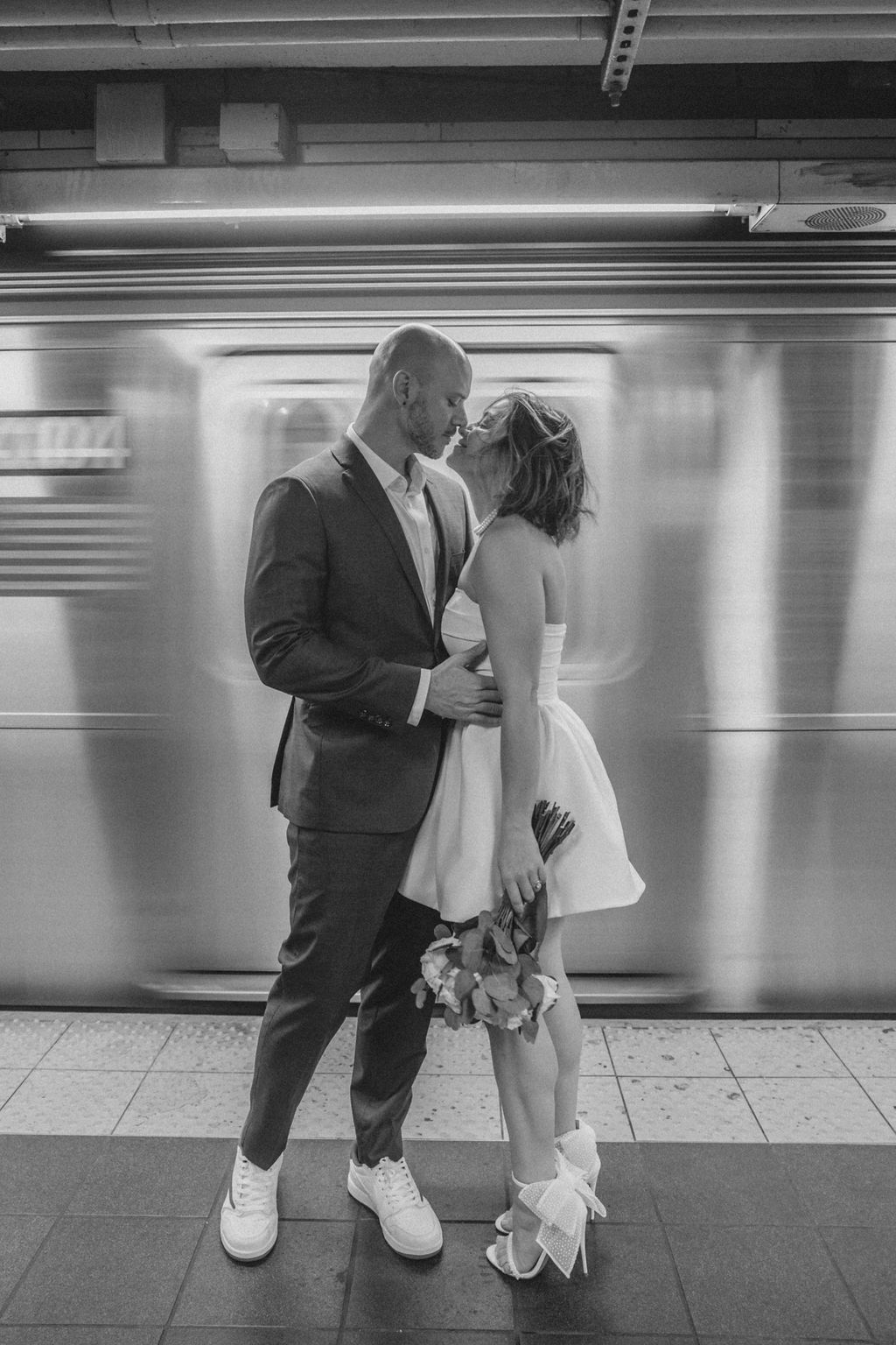 portrait of the newlyweds kissing during their bridal session