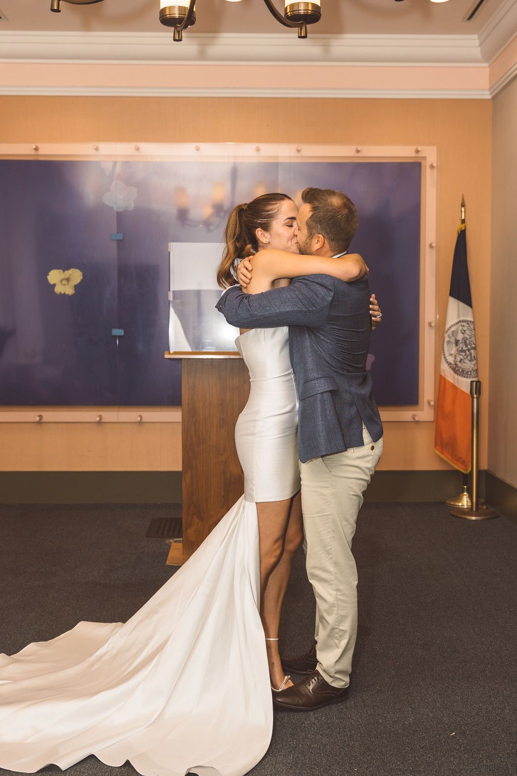 Bride and groom, hugging during their ceremony