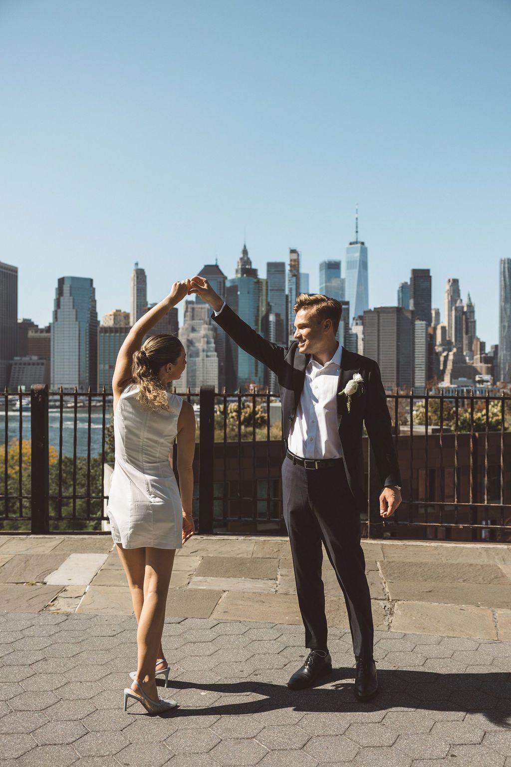 bride and groom dancing during their photoshoot