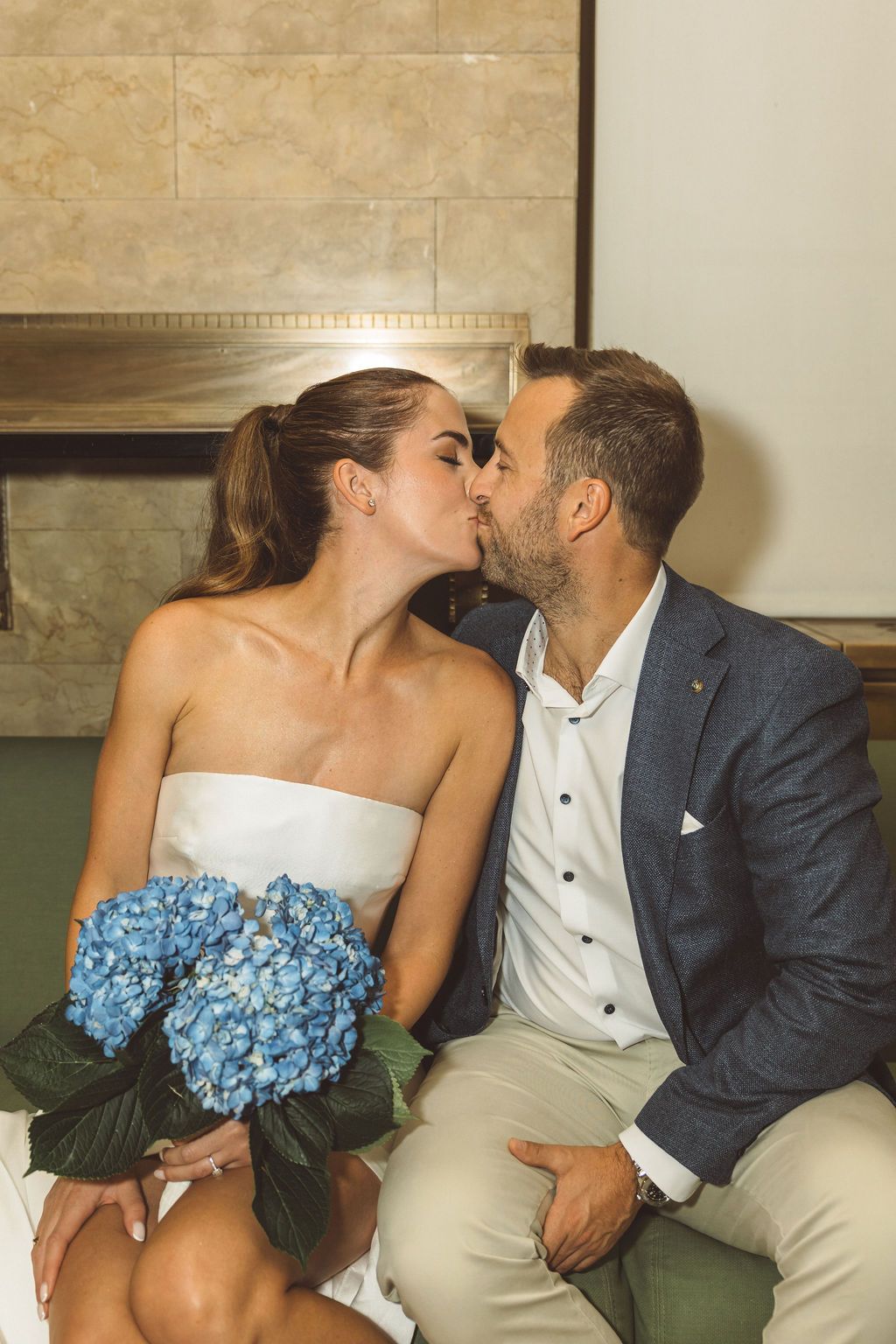 cute picture of the bride and groom kissing